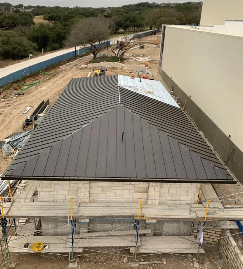 Metal roof new construction with scaffolding in Paradise